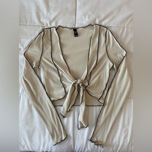 Reverse seam tie top